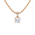 A rose gold chain necklace with a square diamond pendant and small round diamonds above the main stone.