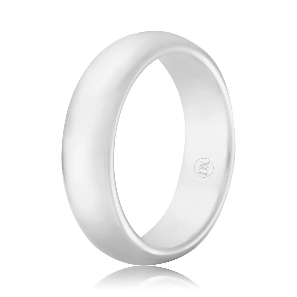 Simple, polished silver band ring with a smooth surface, featuring a small engraved logo inside the band.