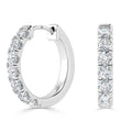 White gold hoop earrings encrusted with round-cut diamonds, shown from side and front on a white background.