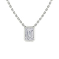 Emerald-cut diamond pendant on a silver chain necklace, shown on a white background.