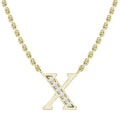 Gold chain necklace with an X pendant, featuring a diagonal row of small sparkling diamonds.