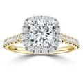 Gold ring with a cushion-cut diamond center, halo of smaller diamonds, and diamond-accented band.