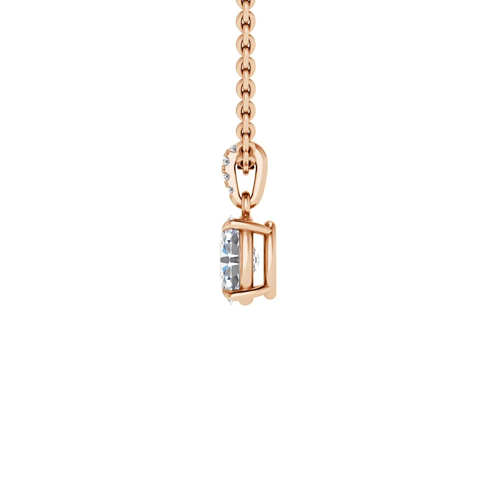 A rose gold chain necklace with a round, clear gemstone pendant set in a minimalist bezel setting.