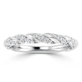 White gold ring with a twisted band design, encrusted with small round diamonds in the twist pattern.