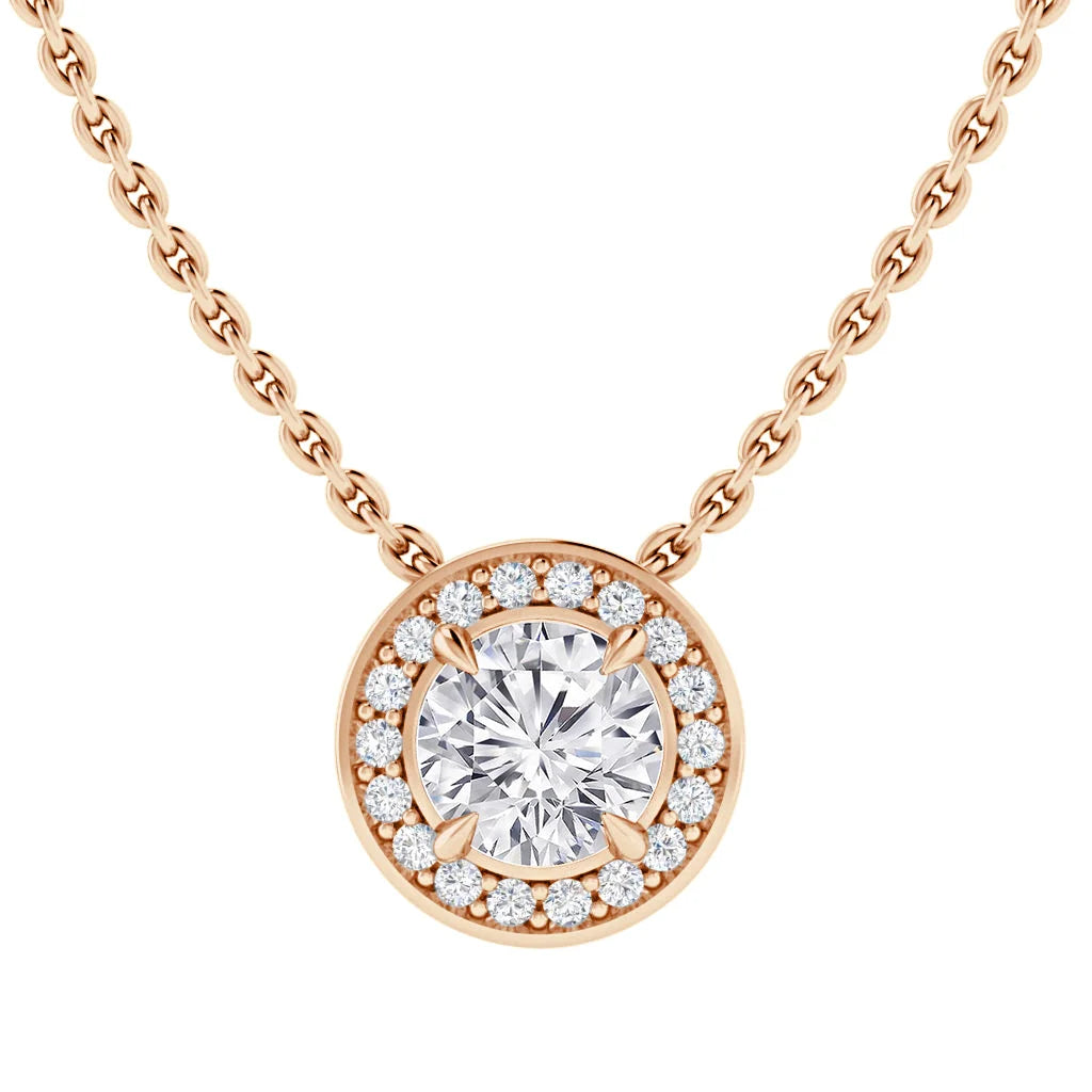 Rose gold necklace with a round diamond pendant, surrounded by a halo of smaller diamonds, on a simple chain.