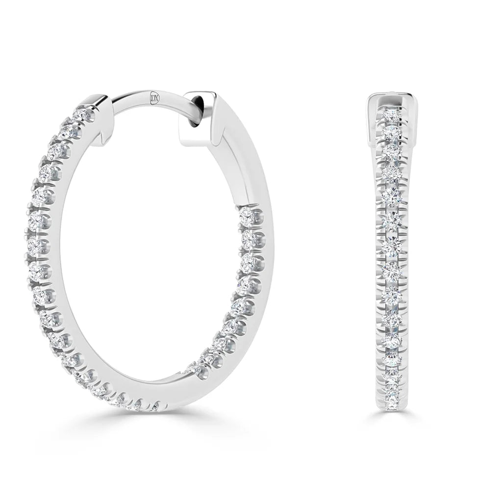 White gold hoop earrings set with small round diamonds, shown from side and front angles on a white background.