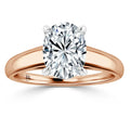 Oval diamond solitaire ring with a rose gold band and four-prong white gold setting, on white background.
