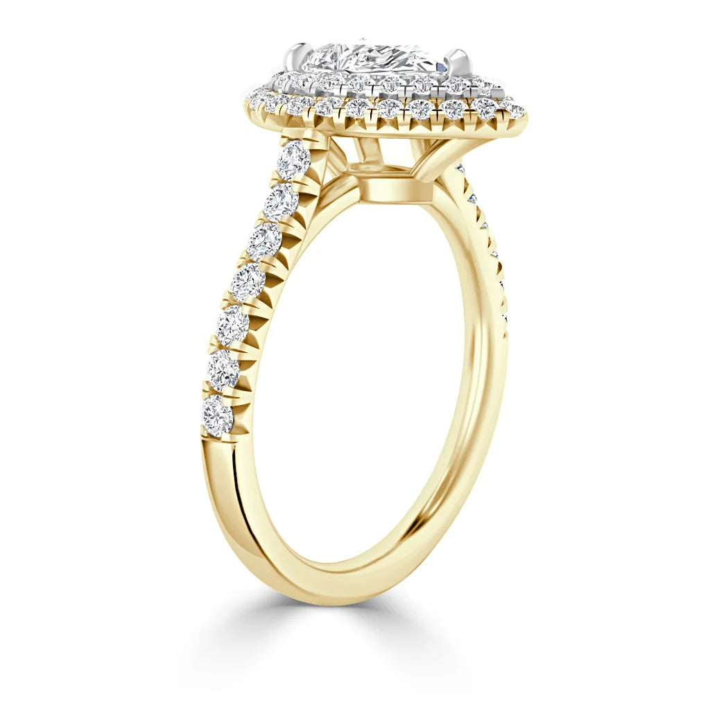 Gold ring with a pavé diamond band and a large oval diamond center surrounded by a double halo of diamonds.