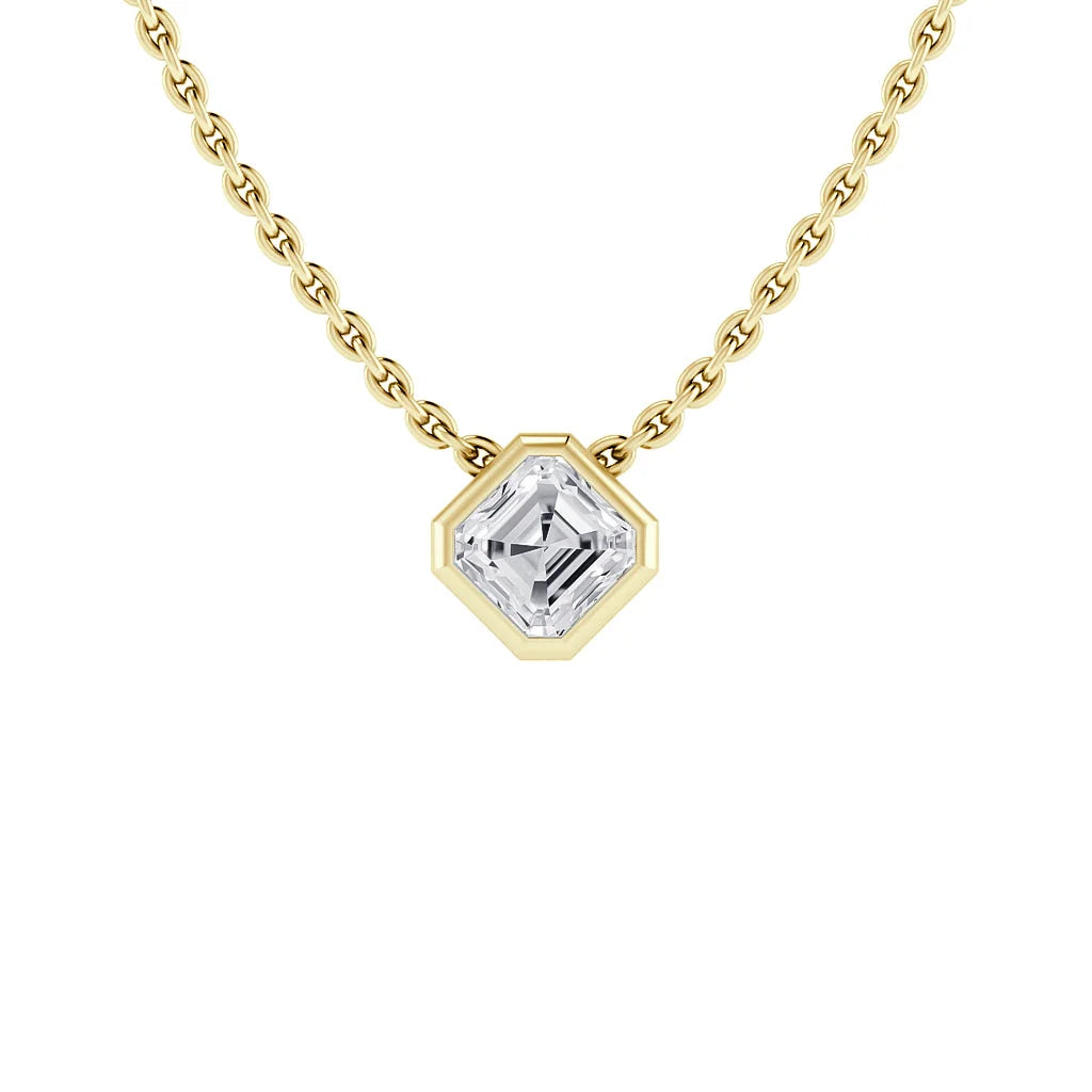 Gold chain necklace with a hexagon bezel-set clear gemstone pendant, centered on a white background.