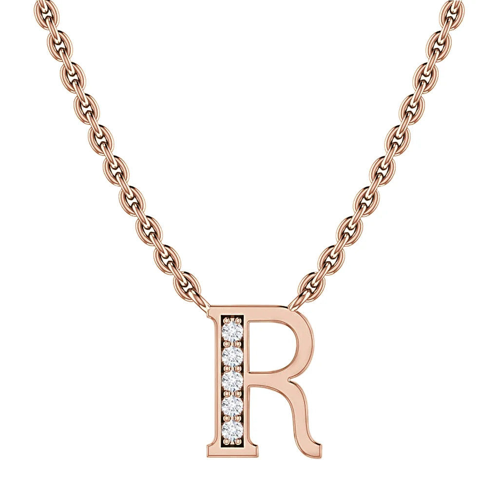 Rose gold chain necklace with a letter R pendant, half encrusted with small sparkling diamonds.