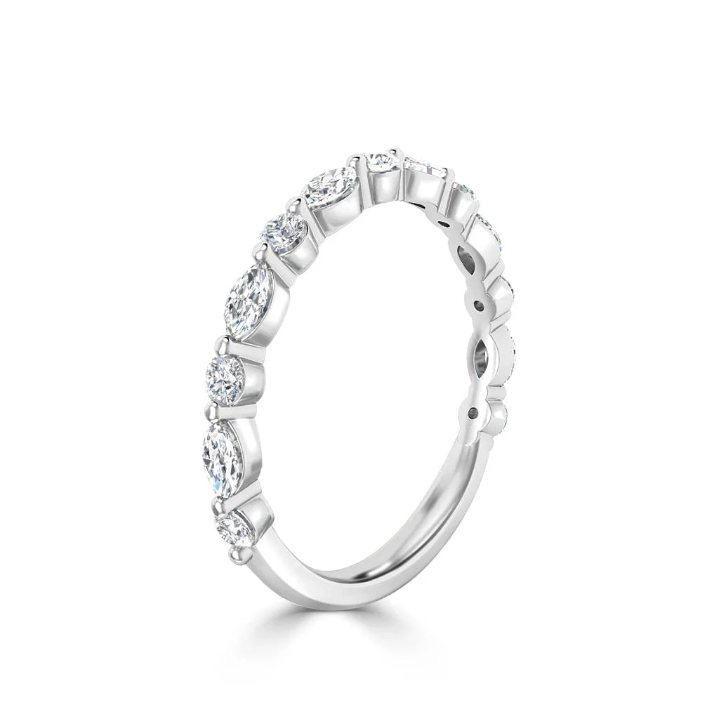A white gold ring with round, bezel-set diamonds on the top half, shown on a white background.