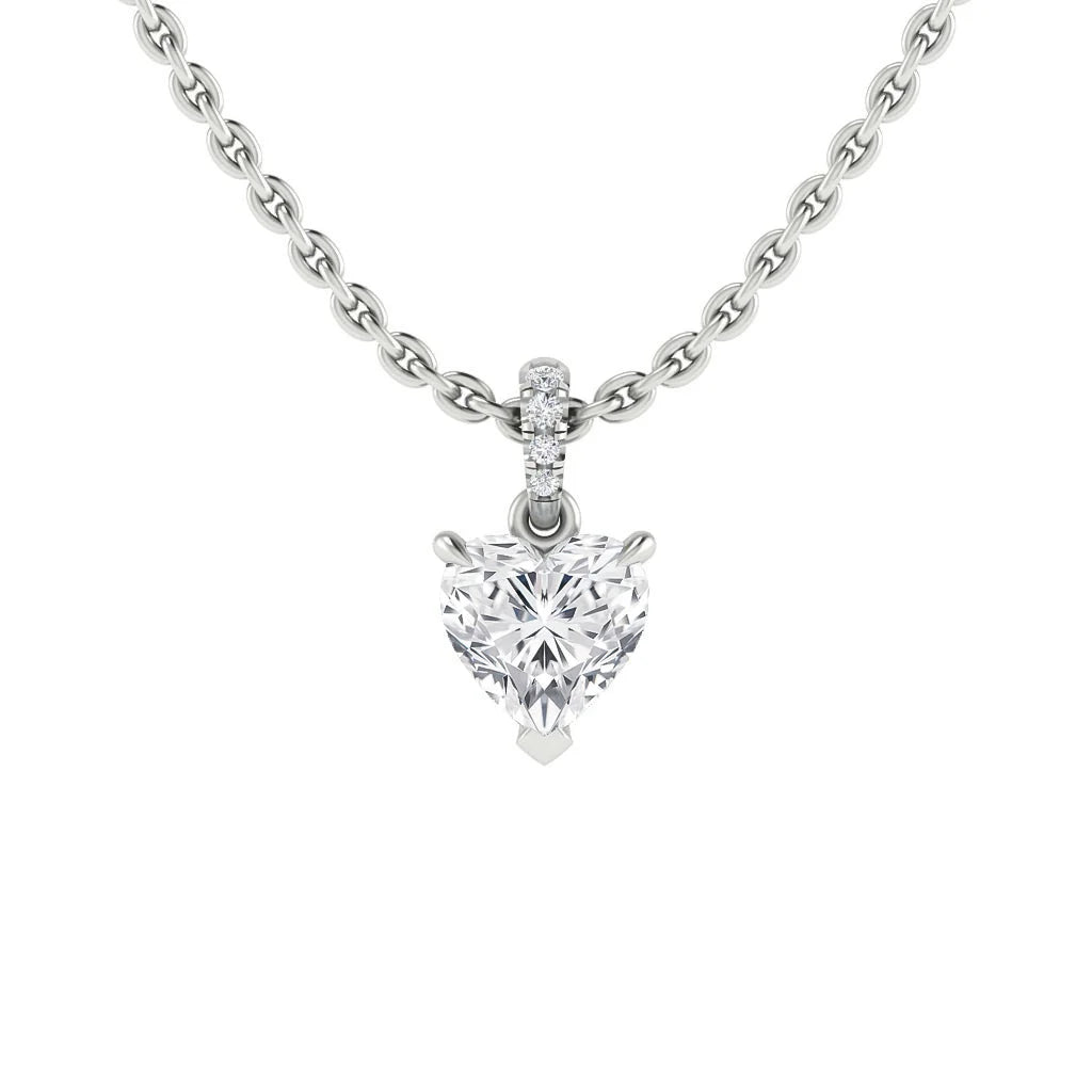 Silver chain necklace with a heart-shaped diamond pendant and three small diamonds above it, on a white background.