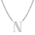 Silver chain necklace with a letter N pendant, half adorned with small clear gemstones.