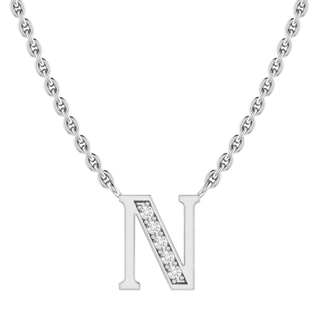 Silver chain necklace with a letter N pendant, half adorned with small clear gemstones.