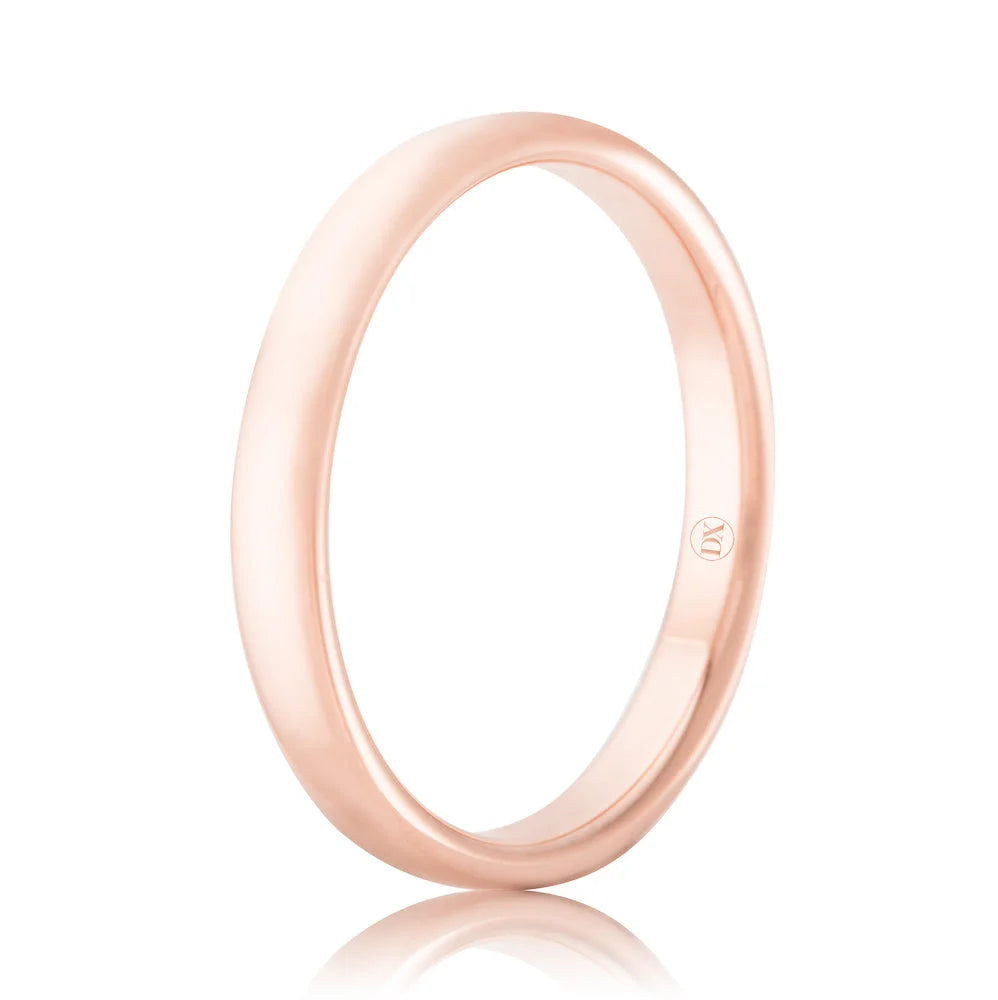 A simple rose gold wedding band with a polished finish, shown against a white background.