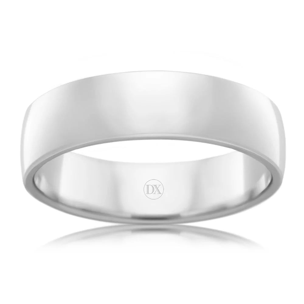 A plain, polished white gold ring with a smooth surface and a subtle “DX” engraving inside.