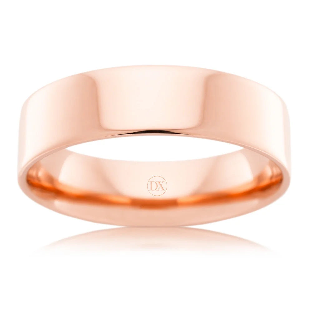 A polished rose gold wedding band with a smooth, shiny surface and a simple, classic design.
