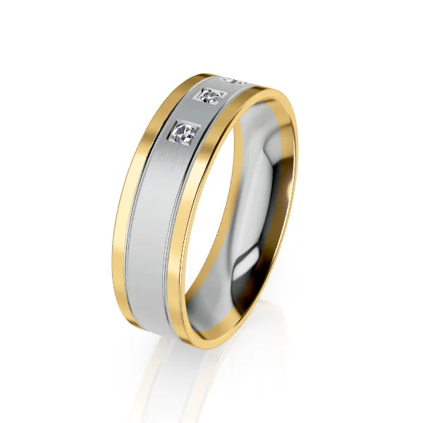 Gold and silver band ring with three small square diamonds set equally along the brushed silver center.