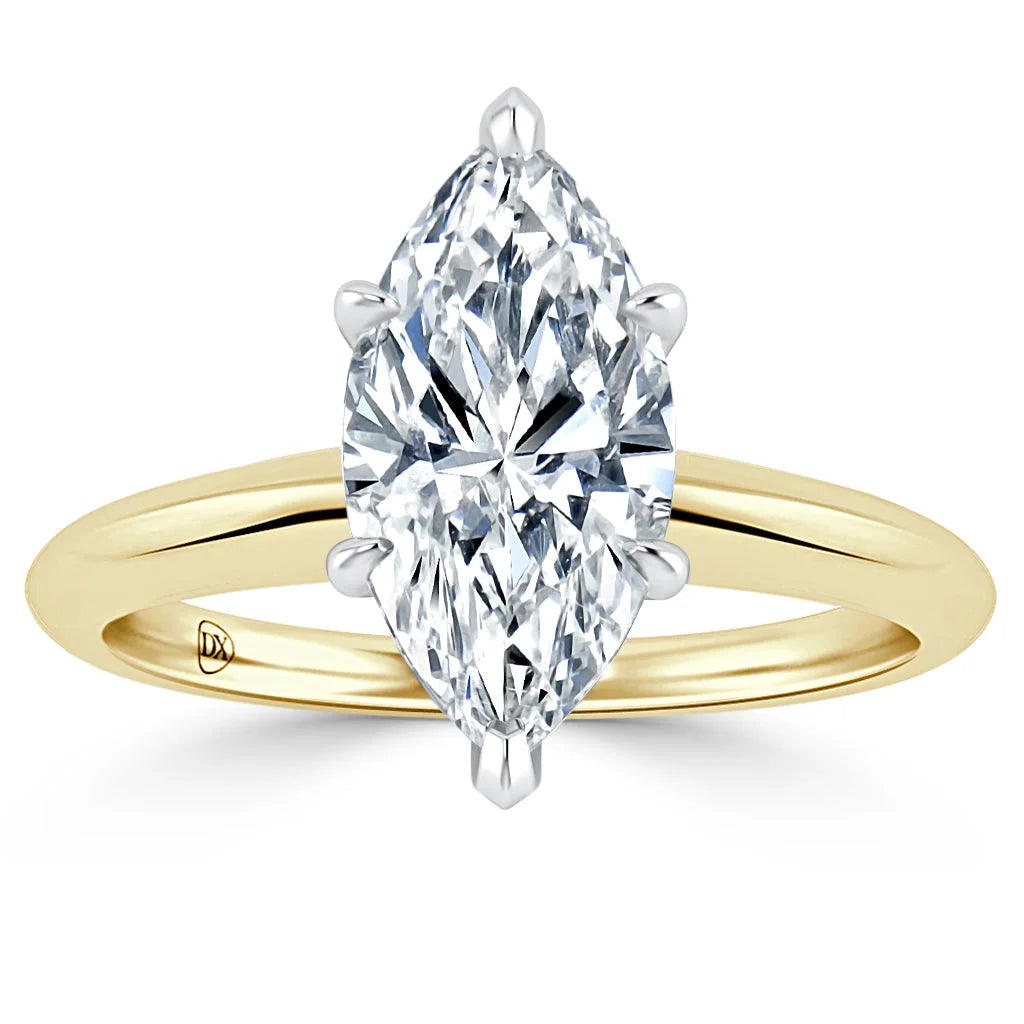 A gold ring with a marquise-cut diamond solitaire in a six-prong setting, viewed from the front.