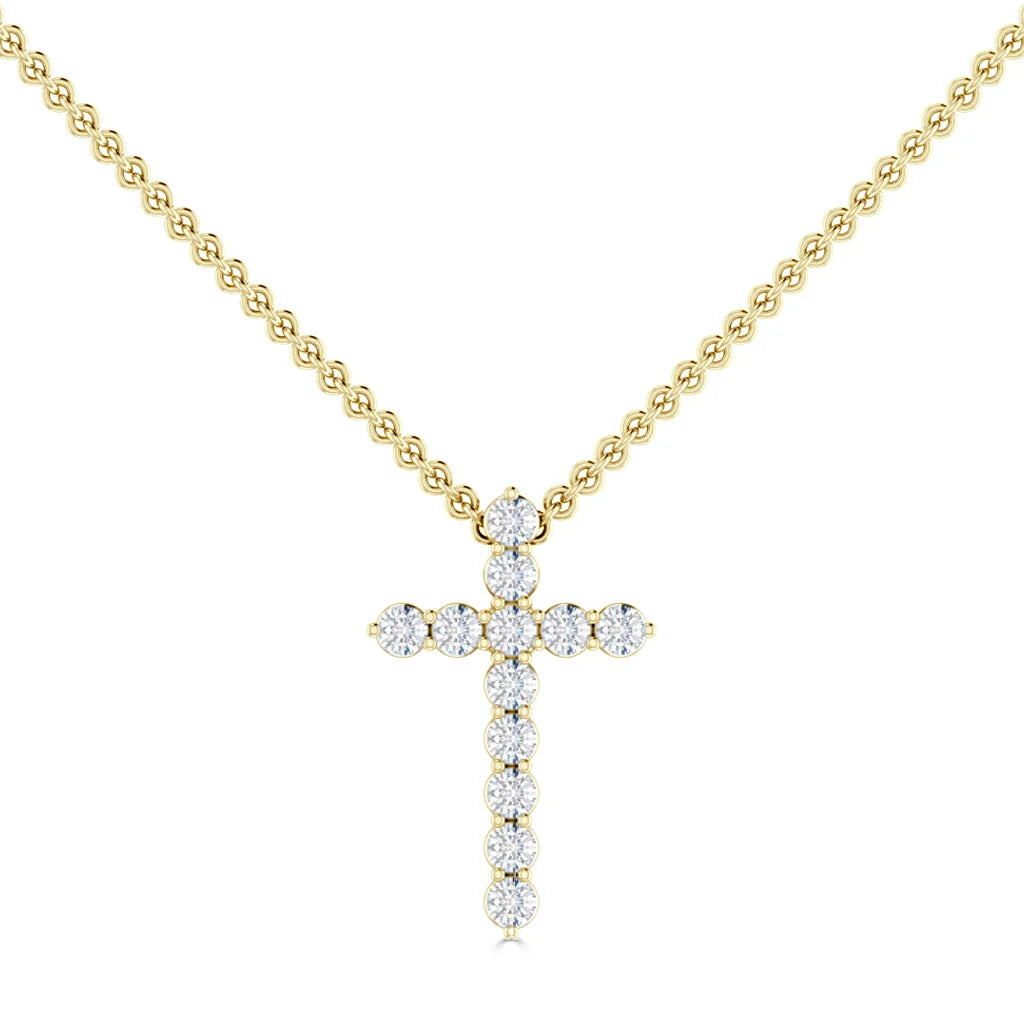 Gold chain necklace with a diamond-studded cross pendant on a white background.
