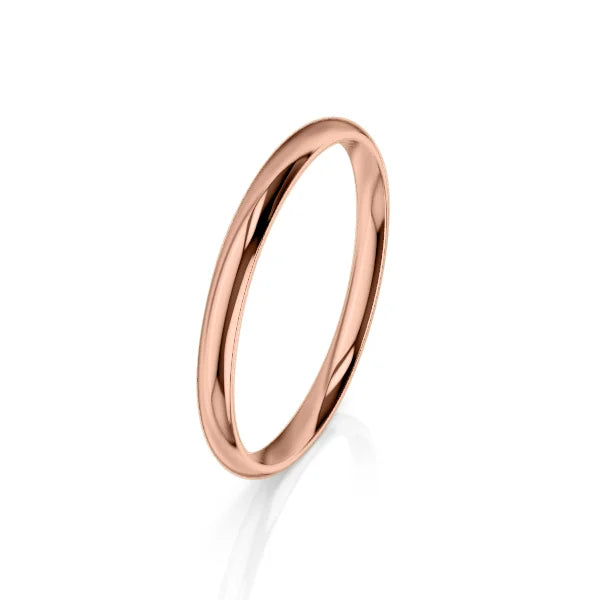 A simple, polished rose gold band ring is shown on a white background with a subtle reflection below.