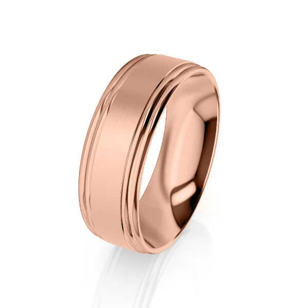 Rose gold wedding band with a brushed center and polished, beveled edges on a white background.