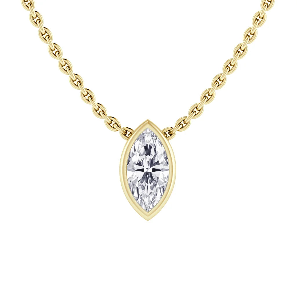 A gold chain necklace with a marquise-cut diamond pendant set in a gold bezel setting.