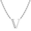Silver necklace with a “V” pendant, left side adorned with small clear gemstones, on a chain.