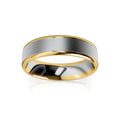 A gold ring with a wide, brushed silver center band and polished gold edges, on a white background.