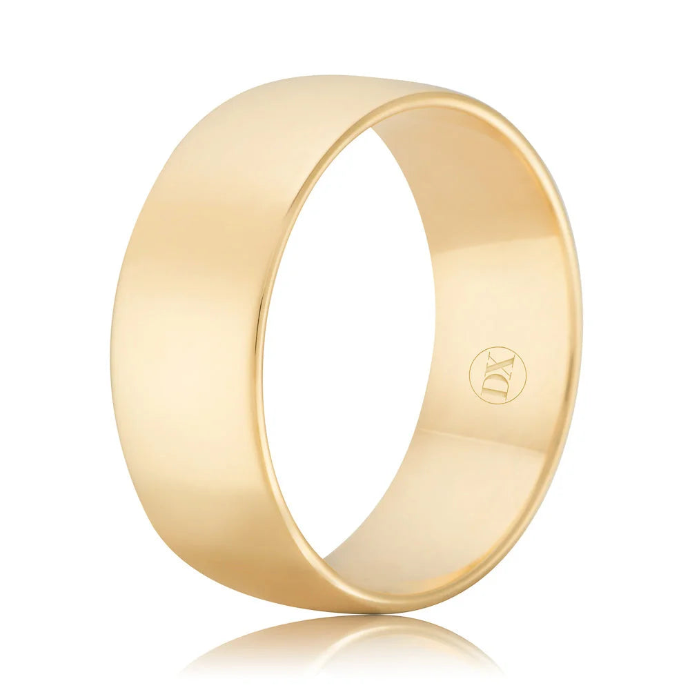 Simple, polished gold band ring with a smooth finish and a small engraved logo on the inner surface.