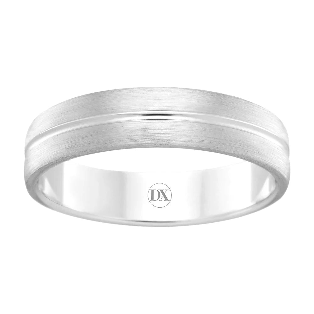 Simple silver ring with a brushed finish, a subtle central groove, and DX engraved inside the band.