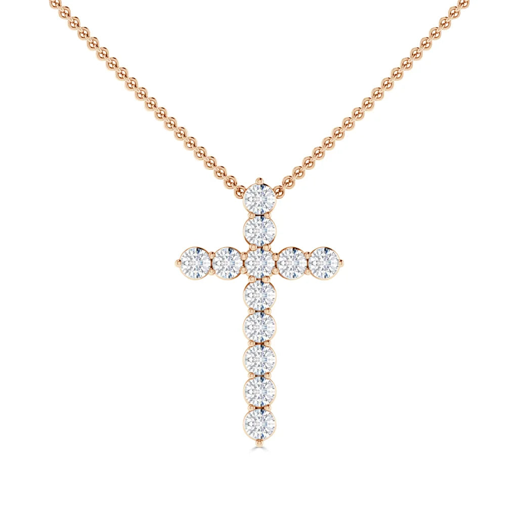Gold beaded chain necklace with a cross pendant made of round, sparkling white diamonds.