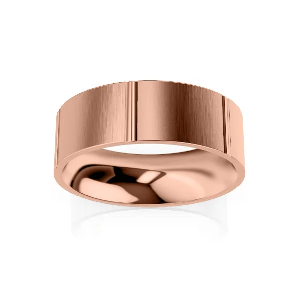 A wide, brushed rose gold ring with a flat outer surface and rounded polished interior.