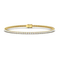 Gold tennis bracelet with a single row of sparkling round diamonds and a secure clasp, on a white background.