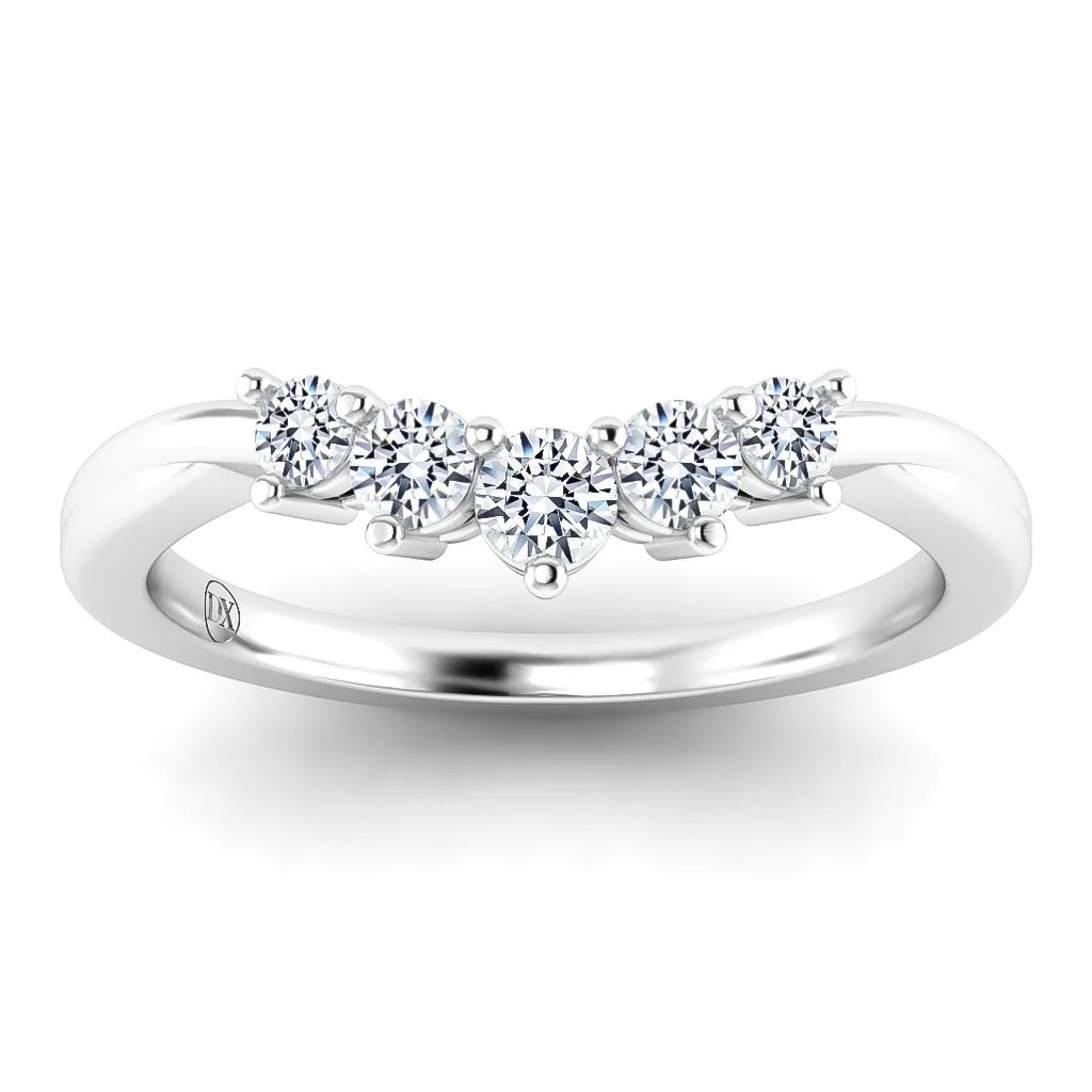 A silver ring with five round diamonds set in a row across the top of the band.