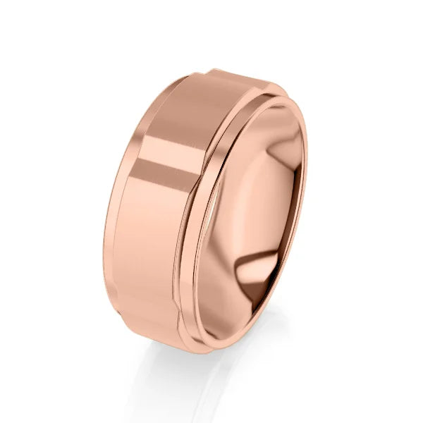 A shiny rose gold ring with a beveled edge and a smooth, polished finish on a white background.