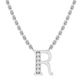 Silver chain necklace with a capital letter R pendant, the left side lined with small diamonds.