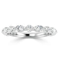 White gold ring featuring alternating round and marquise diamonds set in a continuous pattern around the band.