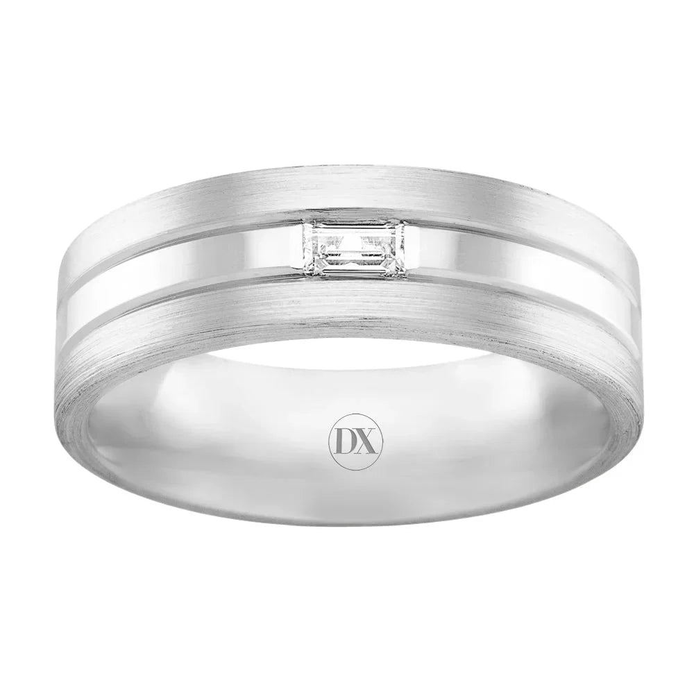 A silver ring with a central rectangular diamond and a brushed texture, featuring “DX” engraved inside.