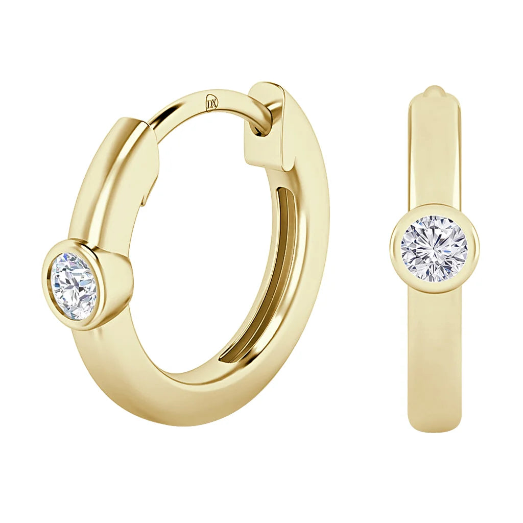 Gold hoop earrings with a round, bezel-set clear gemstone on each, shown from front and side views.