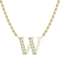 Gold chain necklace with a capital letter W pendant, partly encrusted with sparkling white stones.