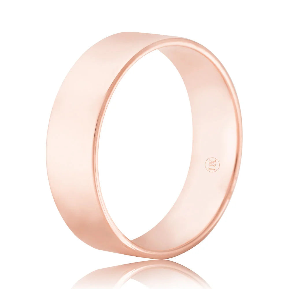 A plain rose gold ring with a smooth, polished finish and a small hallmark on the inner band.