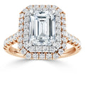 Emerald-cut diamond ring with double diamond halo and split band in rose gold, shown on a white background.
