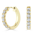 Gold hoop earrings with seven round-cut diamonds set along the front, shown from side and front views.