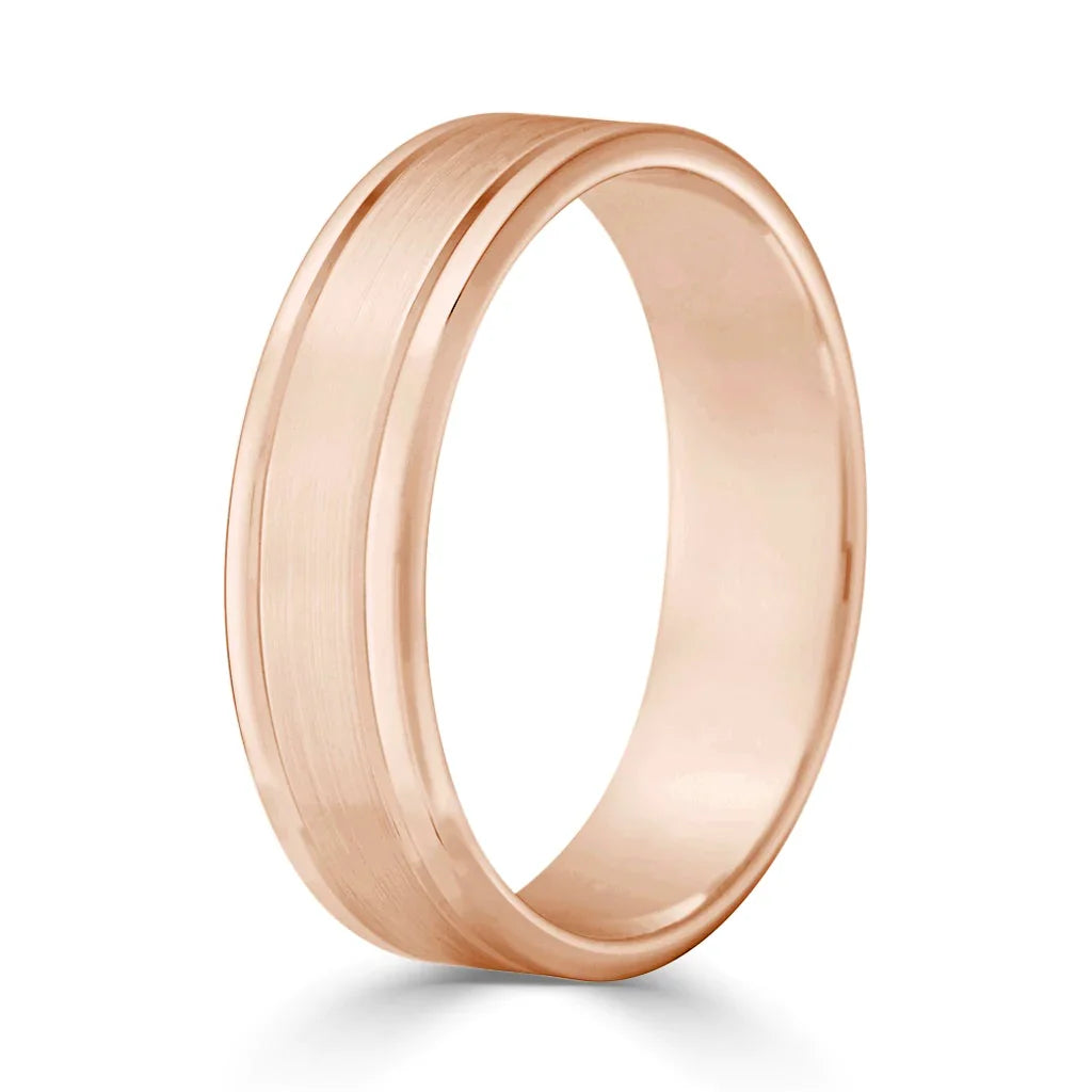 Rose gold wedding band with a matte brushed center and polished beveled edges, shown on a white background.