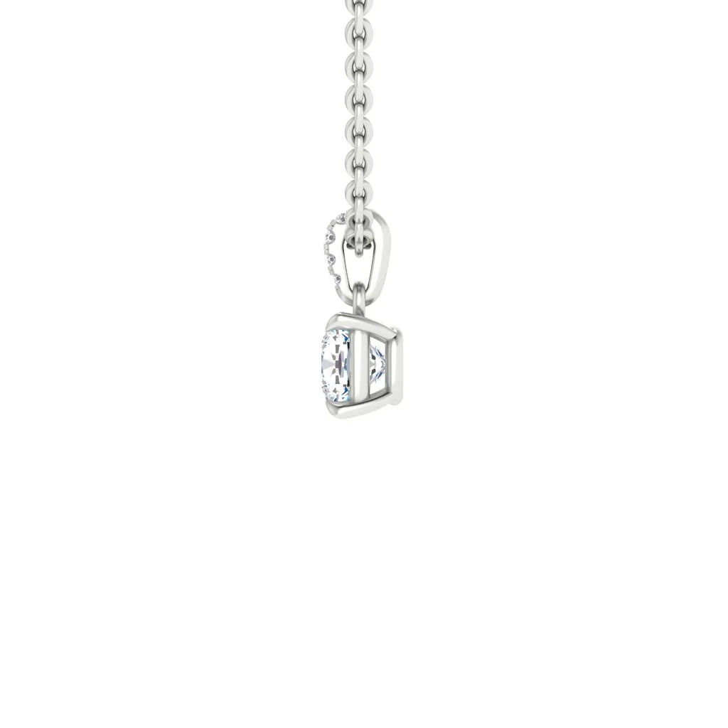 Silver chain necklace with a round, white gemstone pendant in a minimalist, prong setting on a white background.