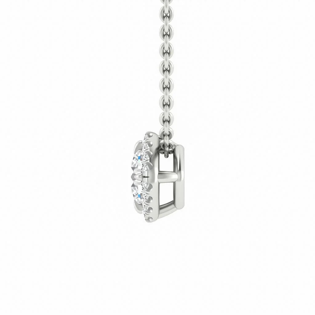 Side view of a silver necklace with a round, diamond-studded pendant on a thin chain, white background.