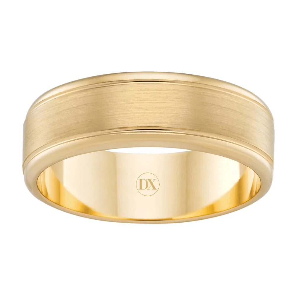 A plain, polished yellow gold ring with a matte finish band and a small DX engraved inside.