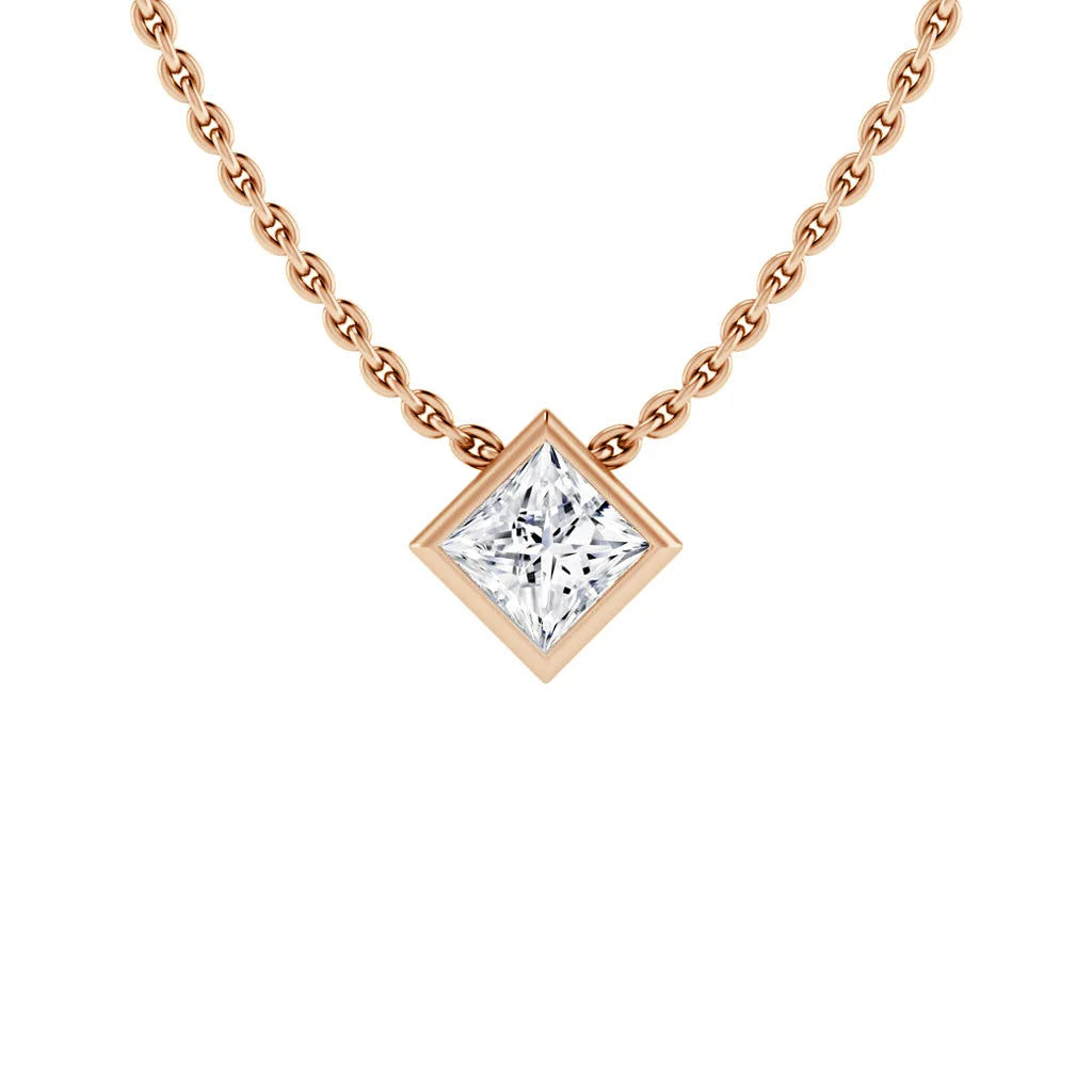 A gold chain necklace with a square diamond pendant set in a rose gold bezel, shown on a white background.