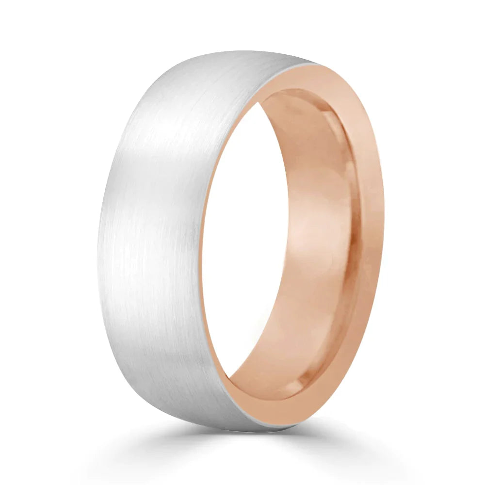 A two-tone ring with a brushed silver exterior and a polished rose gold interior, shown on a white background.